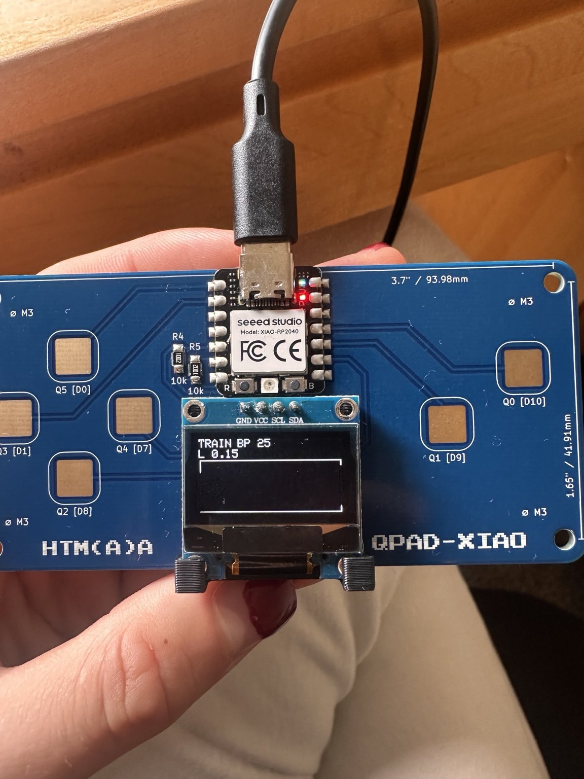 QPAD OLED reading TRAIN BP 25 and L 0.15