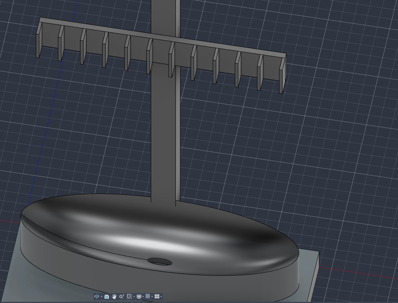 Close-up CAD view of the rounded bowl at the base of the column and the row of evenly spaced guide fins mounted on a crossbar above it