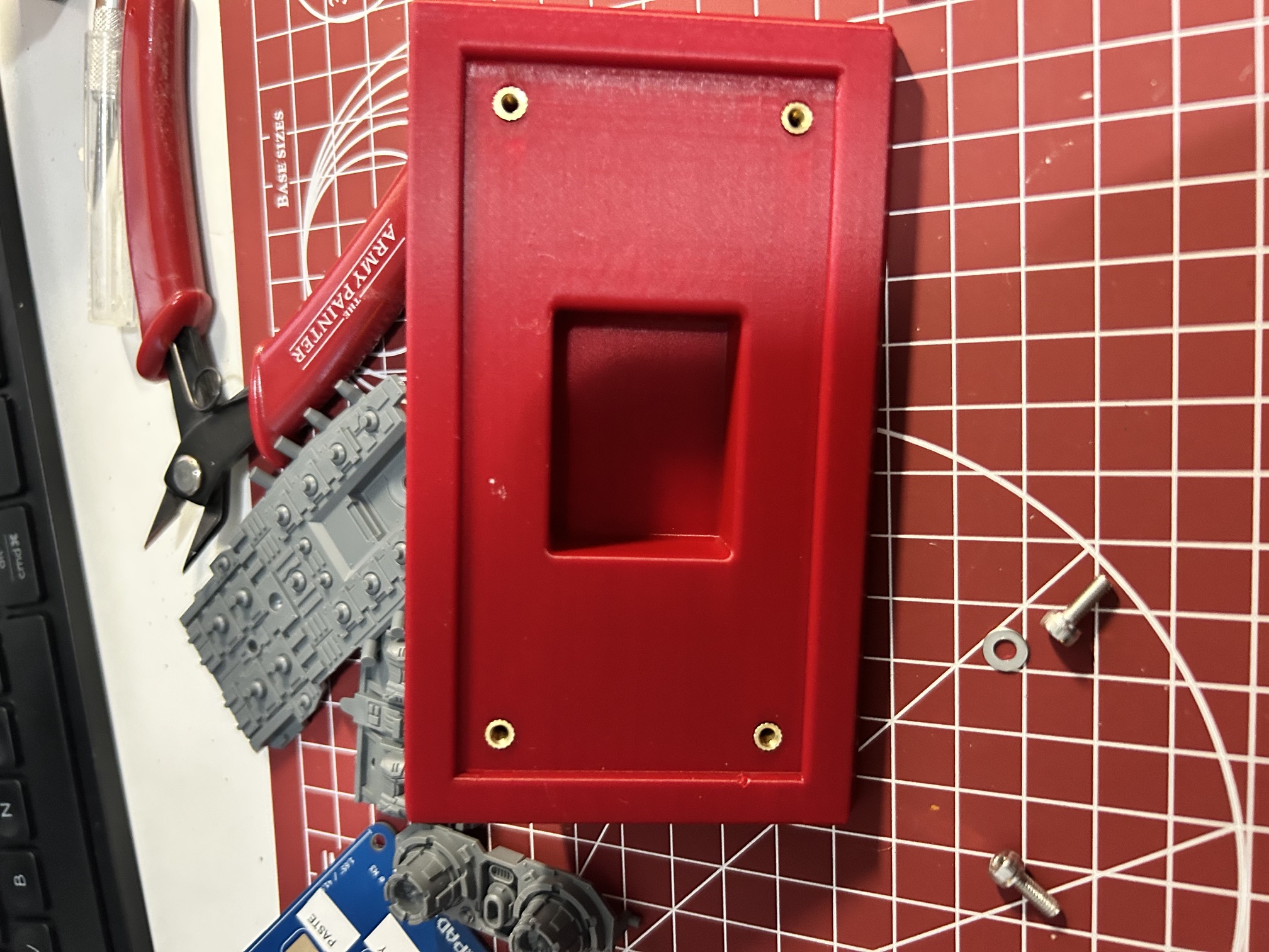 Holder with heat-set inserts installed