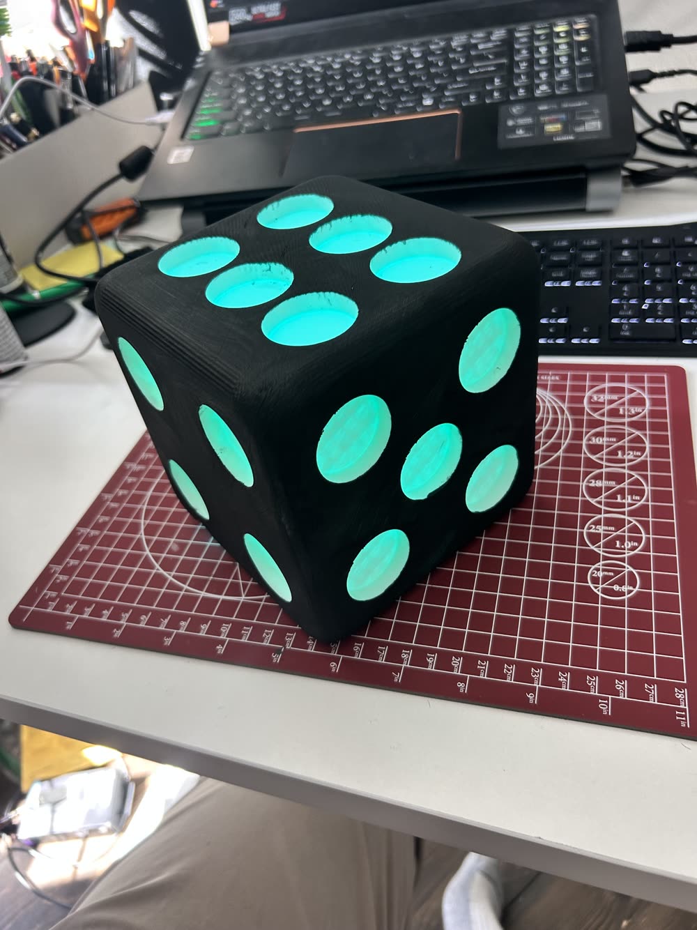 The painted dice lit up from inside