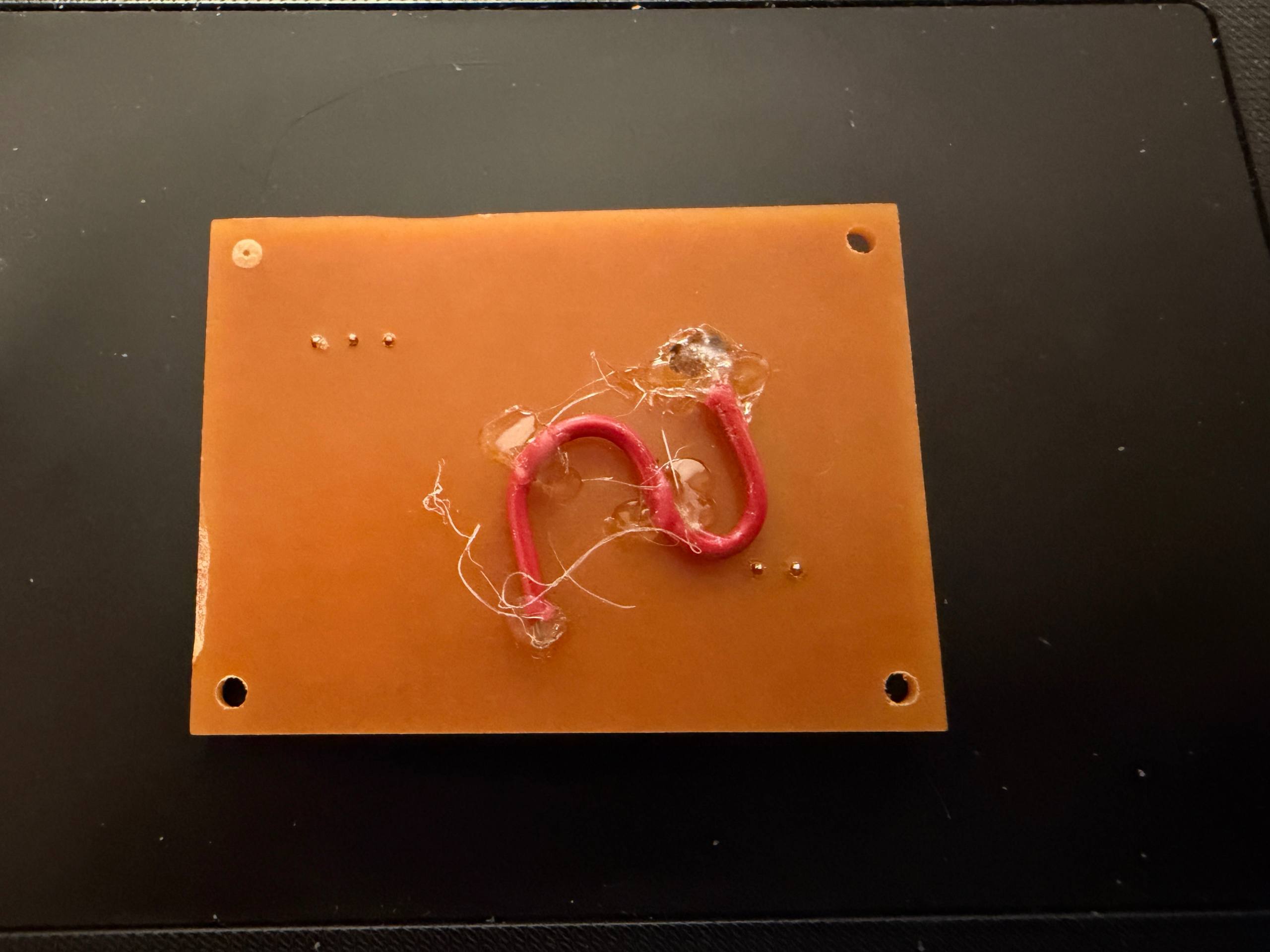 Not my proudest hot-glue work for strain relief