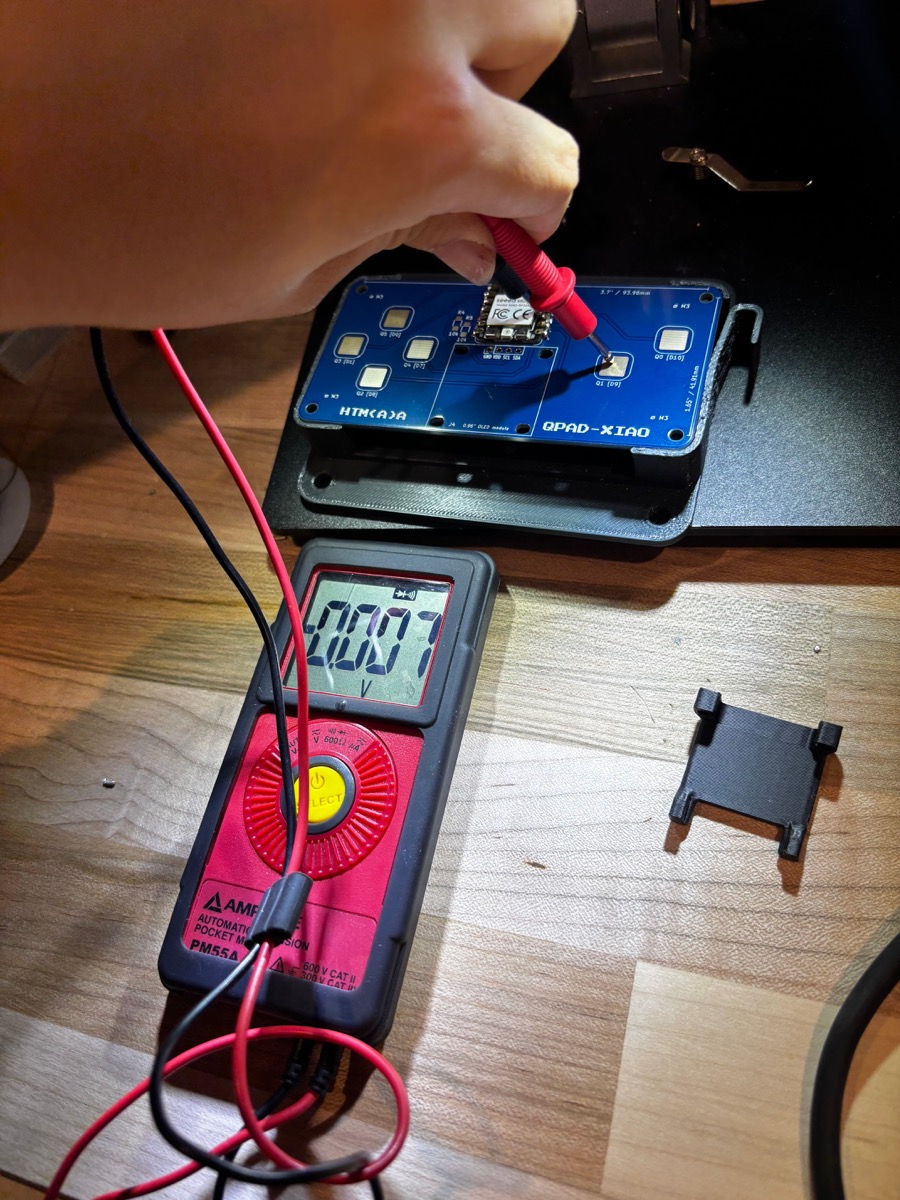Testing the board's connections with a multimeter