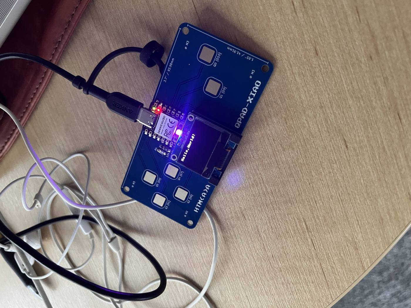 'Hello, World!' on the OLED, confirming the soldering worked for the display