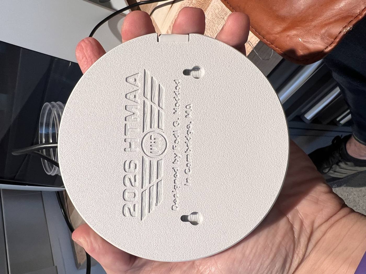 The bottom of the second print turned out better with the larger font while the two keyhole slots envision attaching it to a separate module