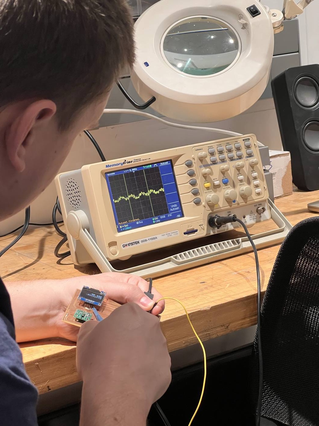 Probing a test board with the oscilloscope