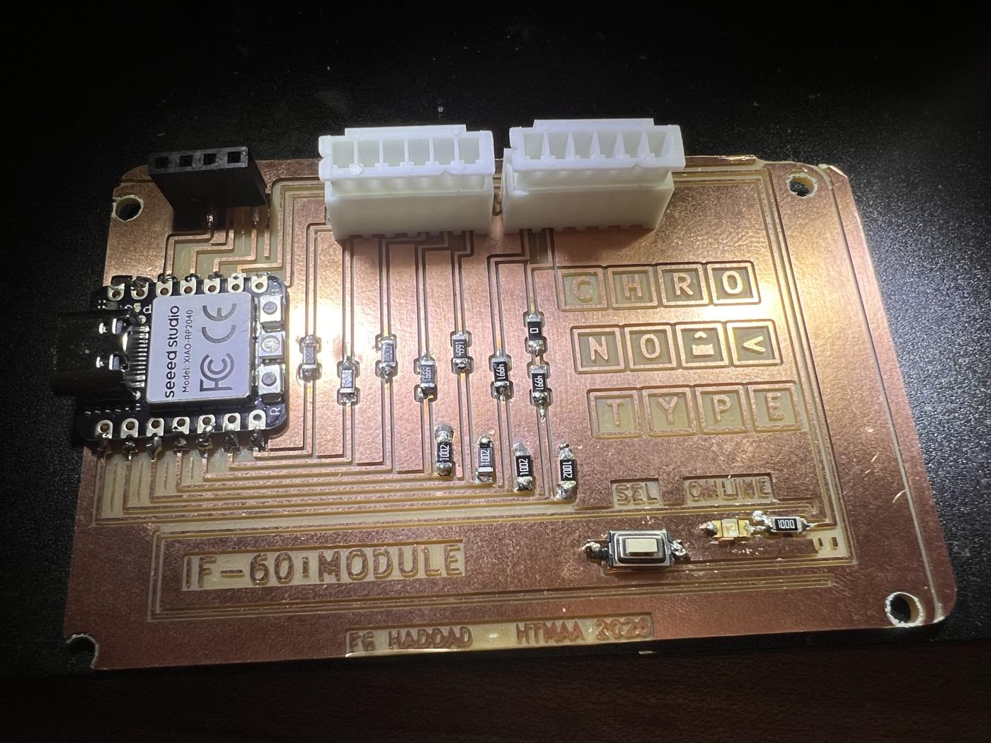 The stuffed board: XIAO RP2040, 13 resistors, the two JST headers, the OLED socket, the SEL switch and the ONLINE LED