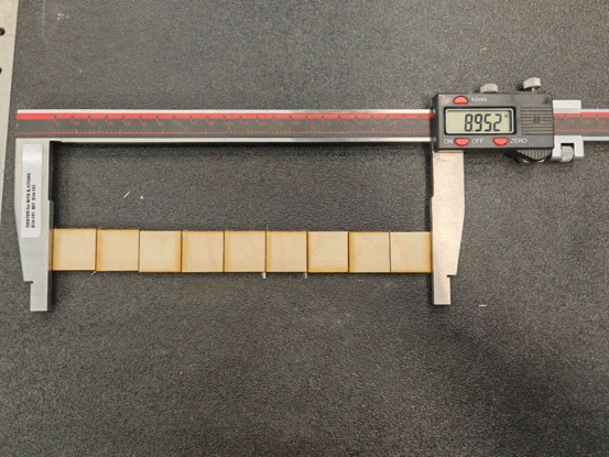 Series of squares used to measure laser-cutting kerf