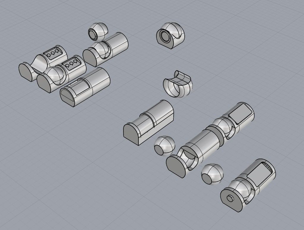 Exploded CAD view of the device, with the body, ball joint, and end caps separated