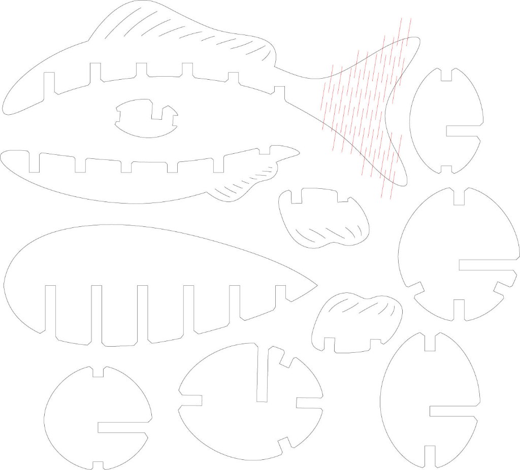 Laser-cut file of the fish pieces, with red lines on the tail
