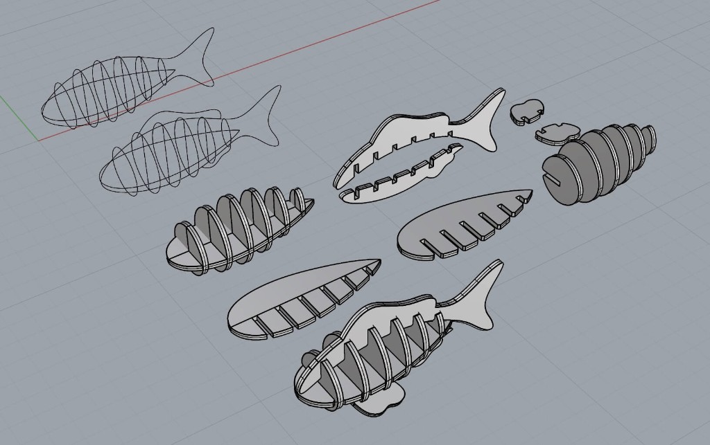 3D model of the slotted cardboard fish, shown assembled and as separate pieces
