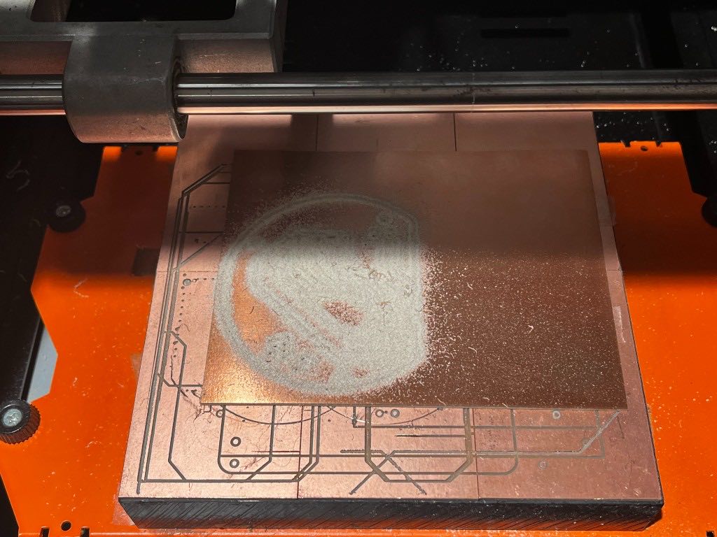 Copper board on the milling machine with the circular board being cut