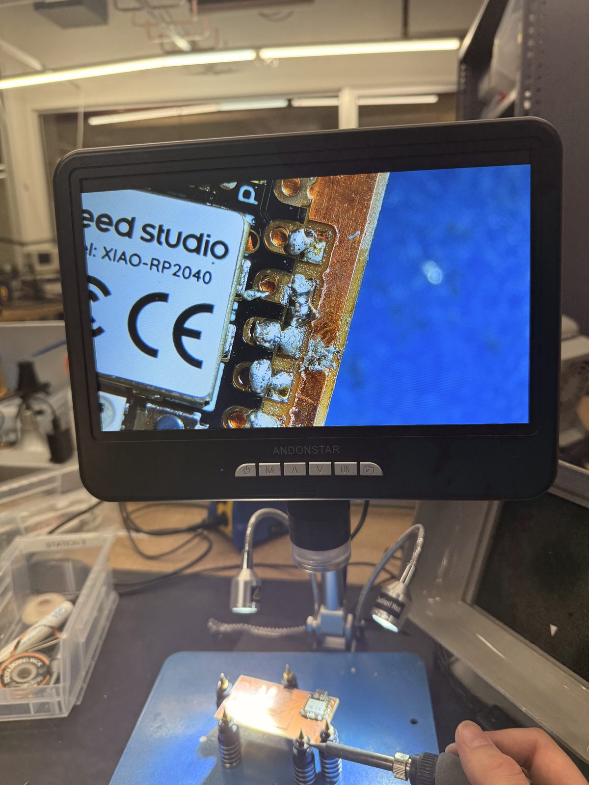 Microscope screen showing the Xiao, with the board underneath