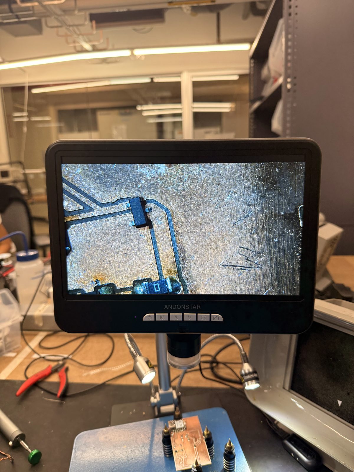 Microscope screen showing a close-up of the board