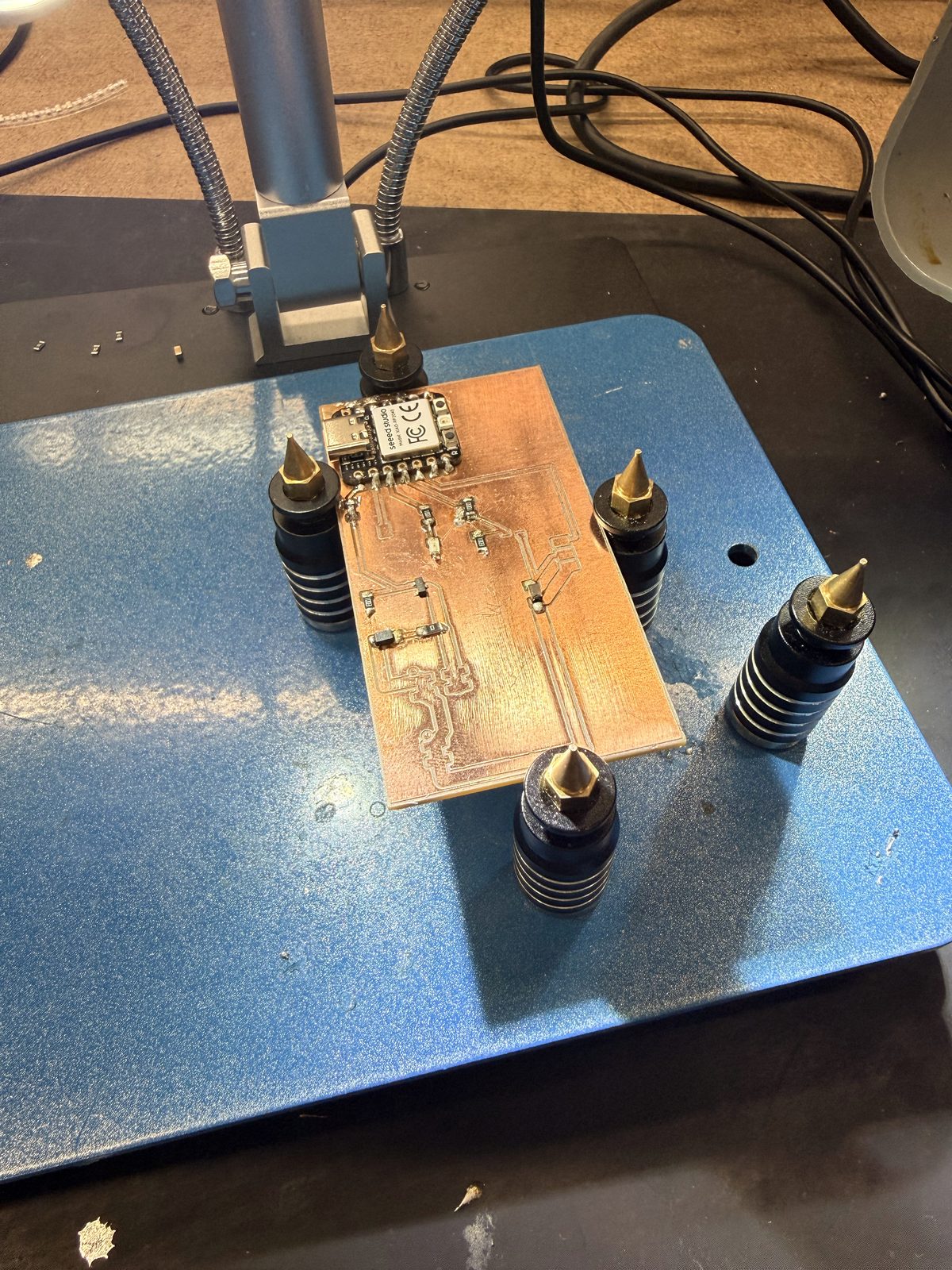 Board in the holder with the Xiao soldered on