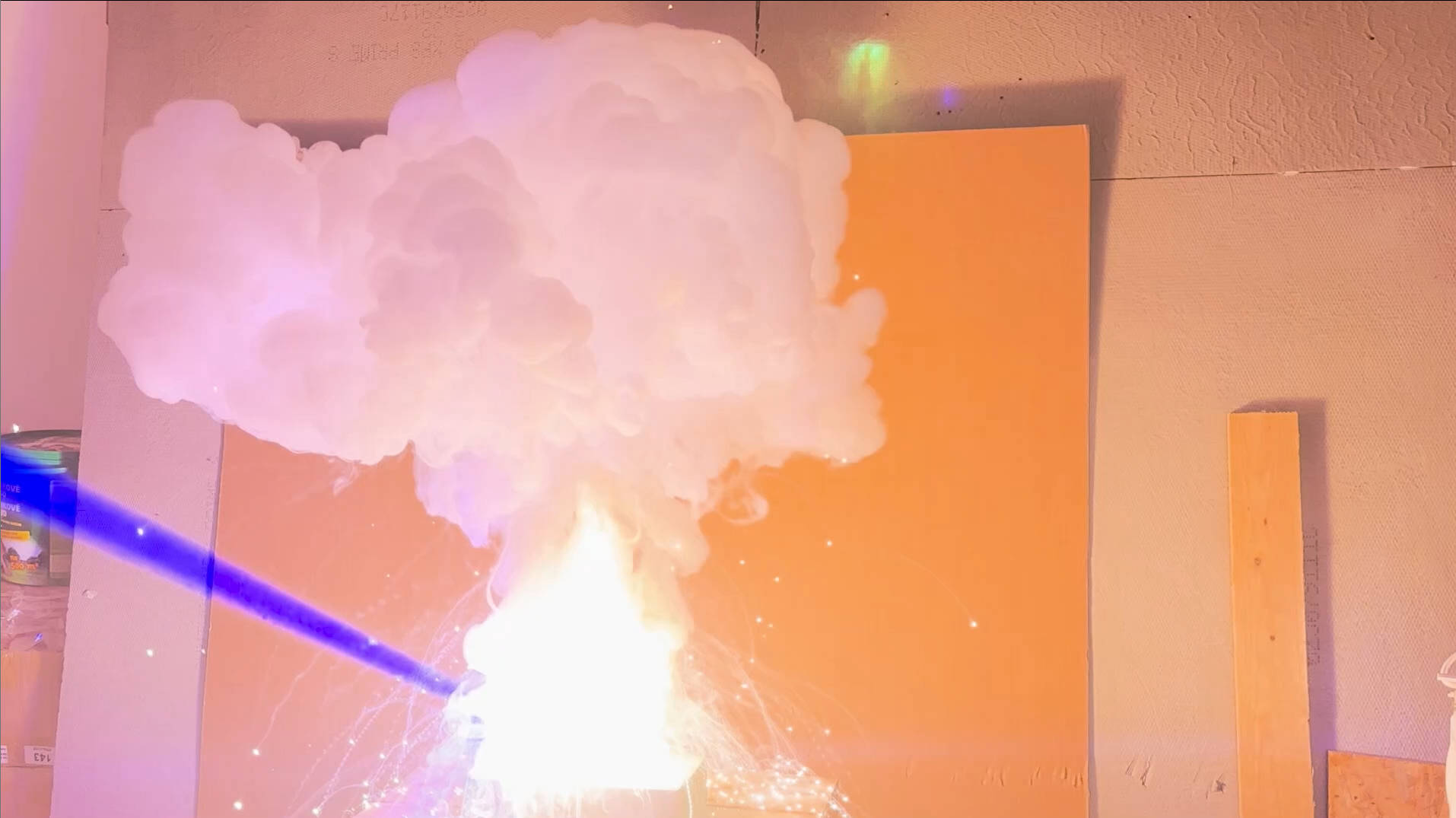Laser beam burning flash powder
