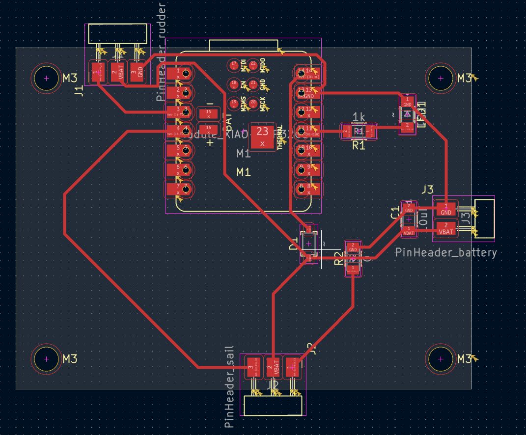 KiCad PCB editor with the final routing: the same board with a 0 ohm resistor R2 added next to the diode, the ground track passing through it while the battery track runs between its pads, and every connection routed