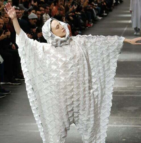 Issey Miyake, triangulated white garment on the runway