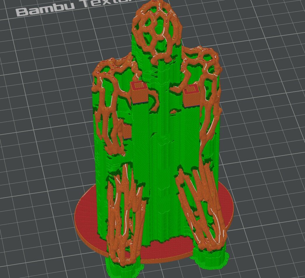 Bambu Studio preview of the figure with green normal supports filling the space under it