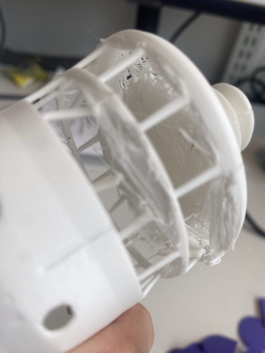 Close-up of the support struts inside the mannequin's neck
