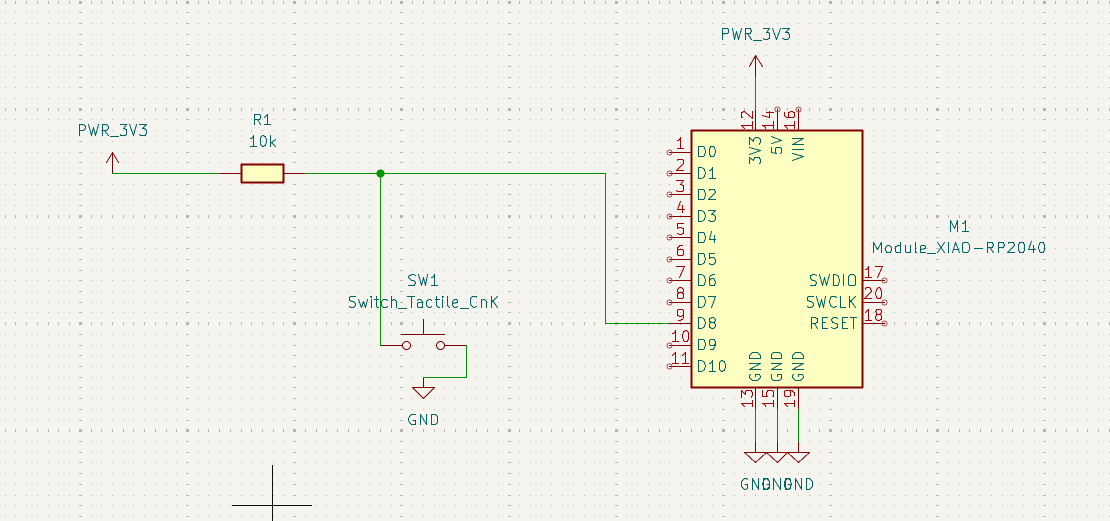 KiCad schematic of a XIAO RP2040 with a tactile switch and a 10k pull-up resistor on pin D8