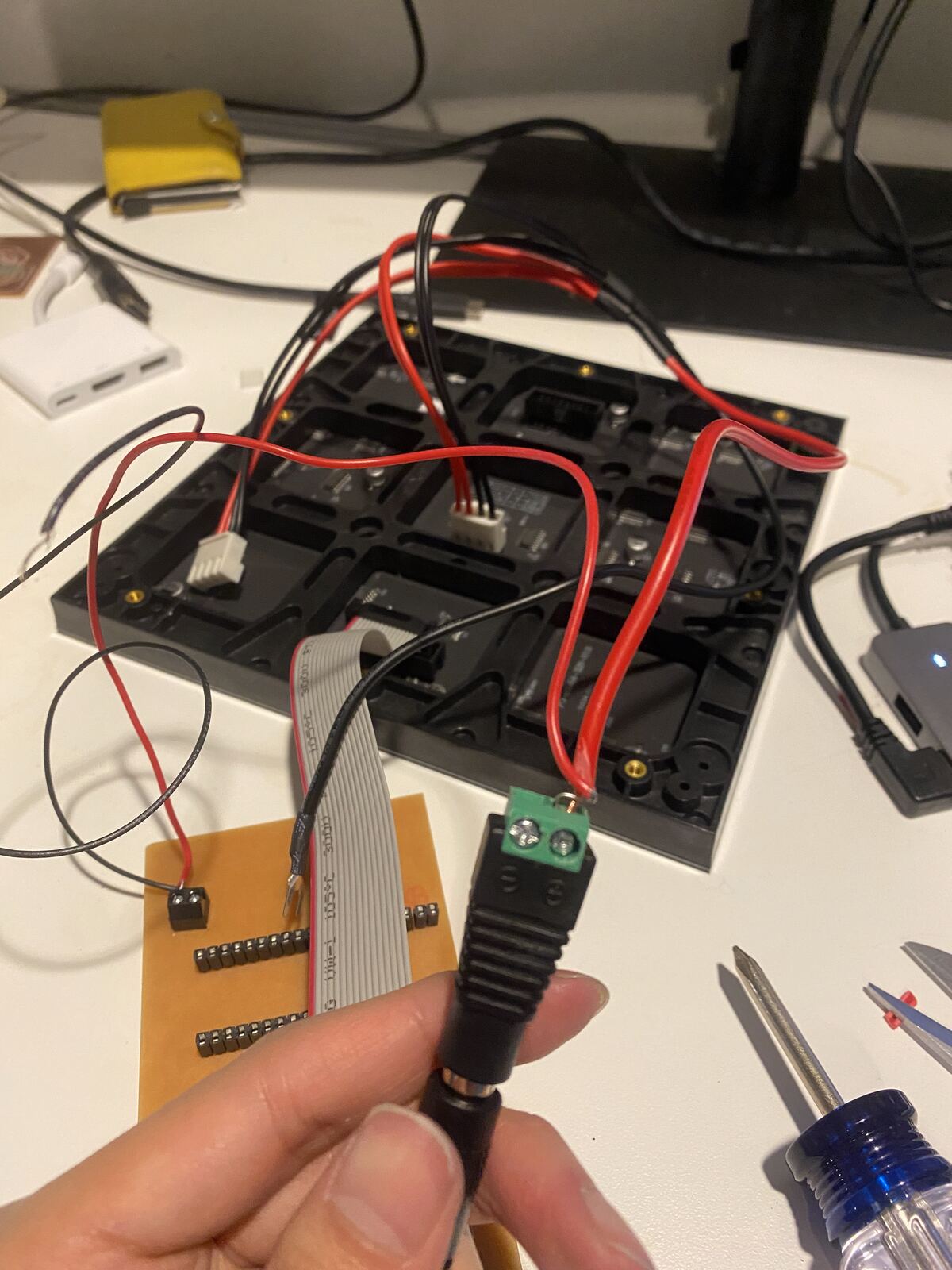 The DC jack wired to the board and the matrix