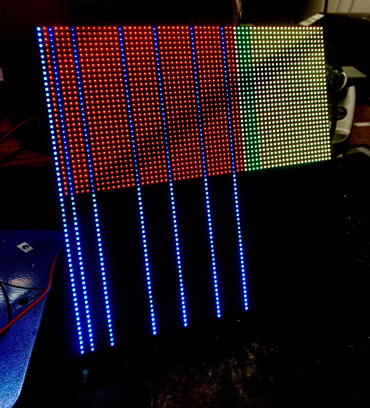 The LED matrix showing red and green on the top half and blue columns below