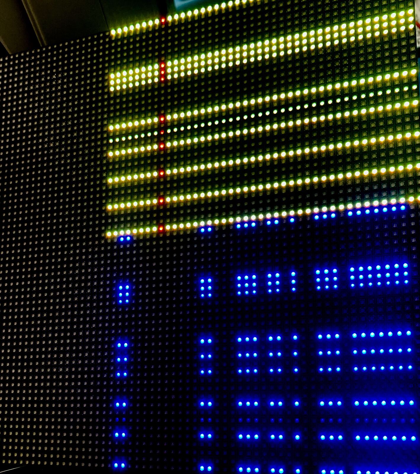 The matrix with yellow lines on top and blue dots below
