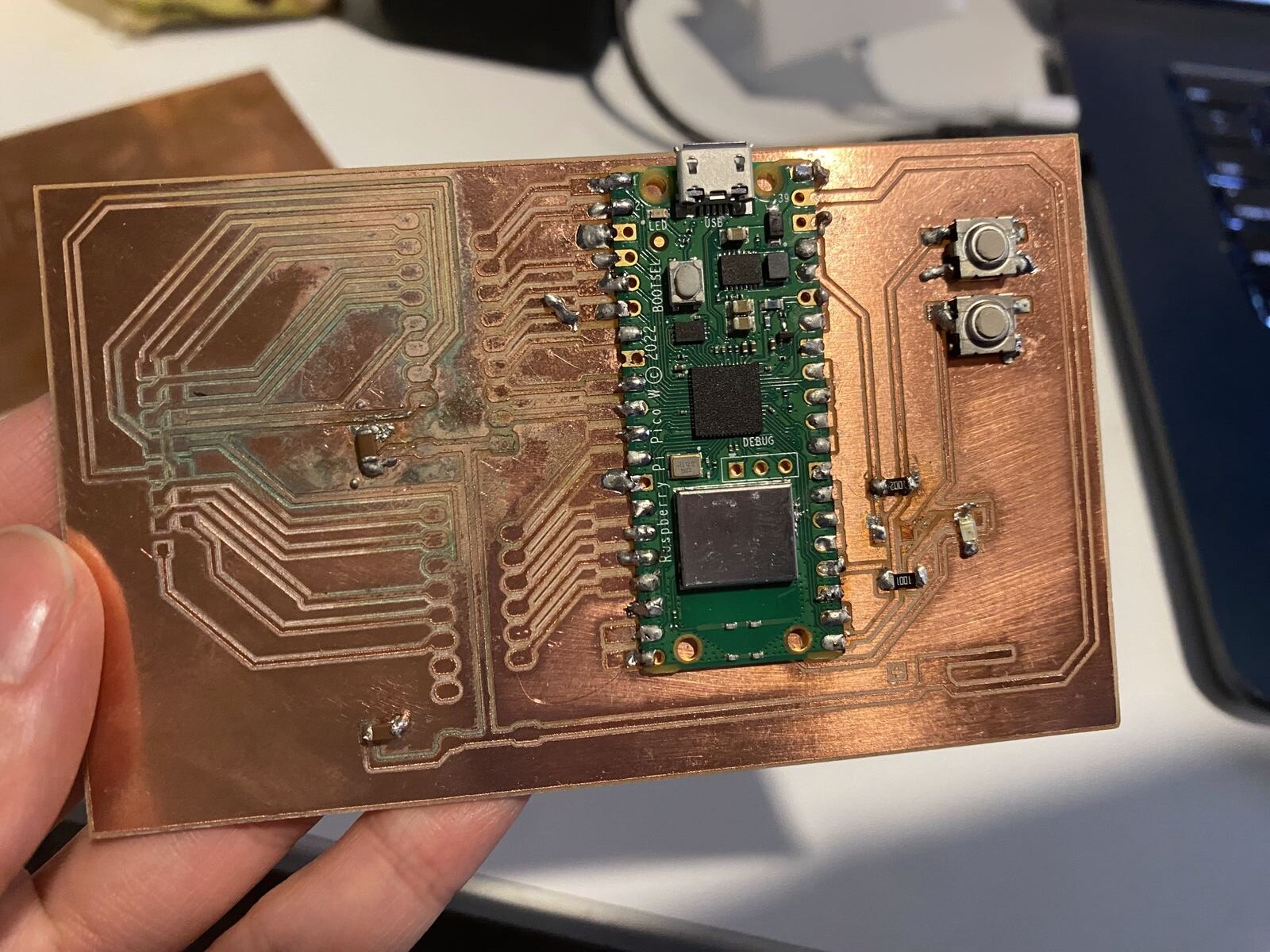 The second board with the Pico soldered on, with green flux-pen marks